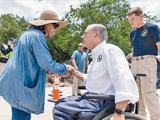 Abbott touts state’s response during tour of flooded region