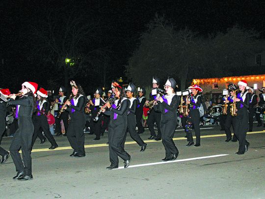 Band pounds the holiday pavement Band pounds the holiday pavement