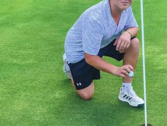 Carson Clark cards hole in one