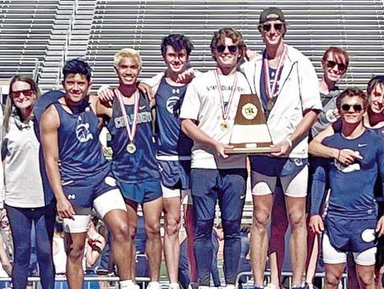 Champion boys win regional track and field title