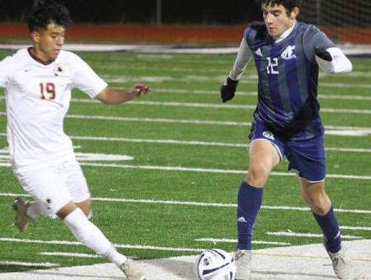 Champion soccer squads split with Buda Johnson