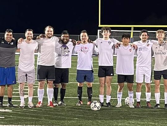 Champion soccer team hosts alumni match