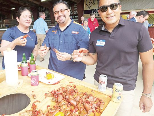 Crawfish boil brings out Rotary members, guests