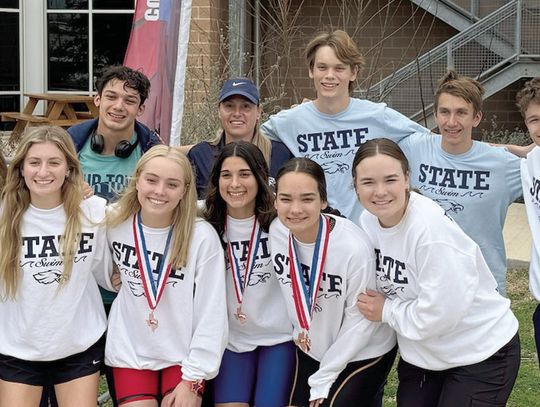 The Geneva swim team competed at the TAPPS state meet and earned a few medals. The swimmers pose for a photo at the meet. Submitted photo
