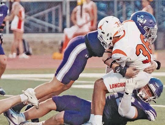 Hounds hold off Horns, 41-34