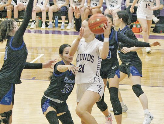 Lady Hounds roll to big win to close out first round of district