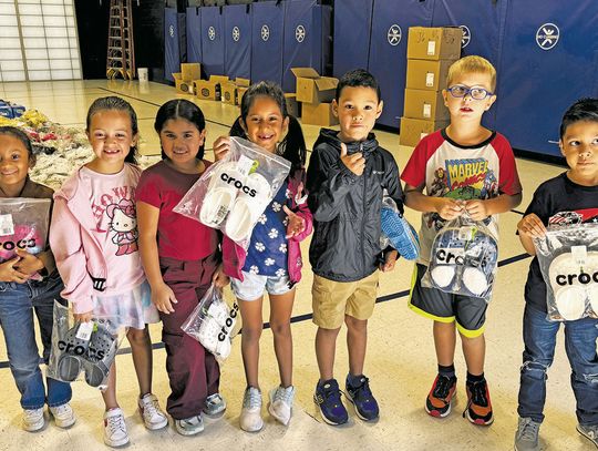 Little Feet, Big Hearts -- Family’s flood ‘moment’ attracts national attention