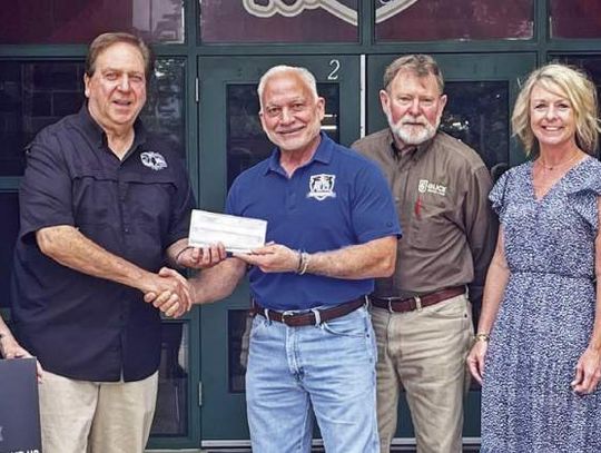 Local rotary donates to school officer program