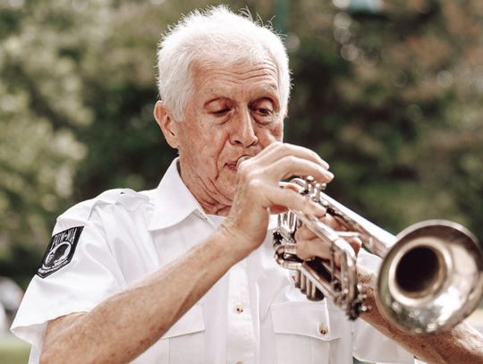 Manzo honored to play Taps for fellow veterans