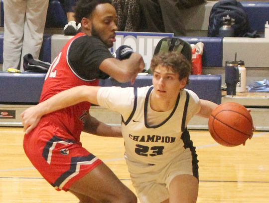 Logan Scott (23) gets around a Veterans Memorial defender during Tuesdays contest for first place in District 26-5A. Star photo by Kerry Barboza