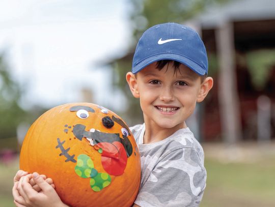 Pumpkin patch visitors are all smiles