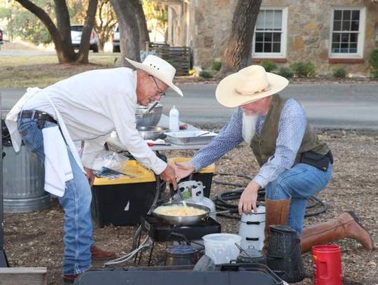 Scrambling eggs for Frost Bank chuck wagon breakfast