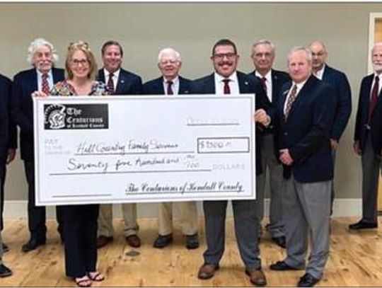 The Centurions of Kendall County present checks to local organizations