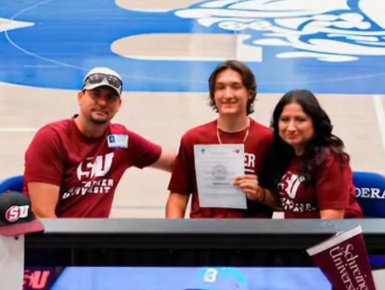 Roger Waid, left, and wife Patricia Waid joined their son Barrett at Bandera High School for his Letter Of Intent signing to play baseball at Schereiner College. Both parents, along with a 14-year-old daughter, were killed Tuesday in a head-on collision on Texas 46 near Boerne.