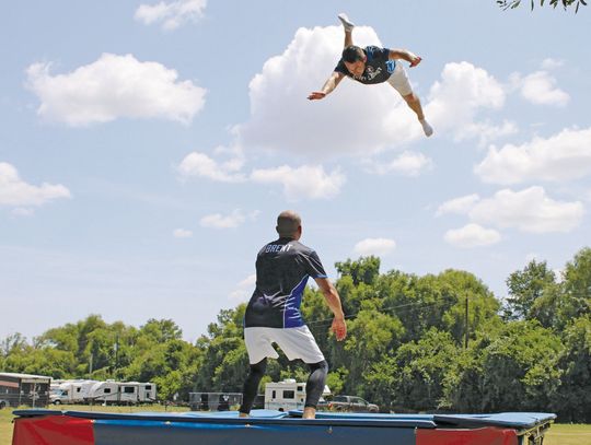 Trampoline act goes above, beyond to entertain fairgoers