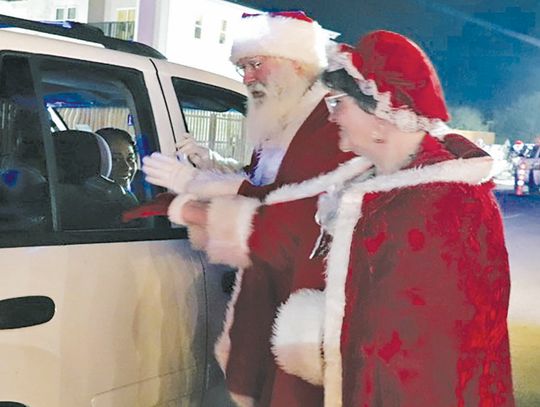 Volunteers make Blue Santa festive event