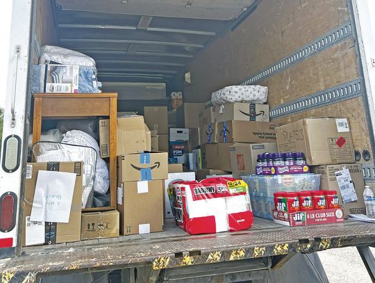 Woman uses social media to raise $15,000 for flood relief