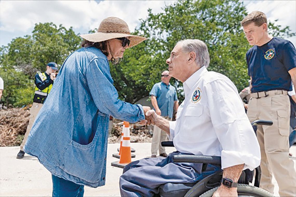 Abbott touts state’s response during tour of flooded region