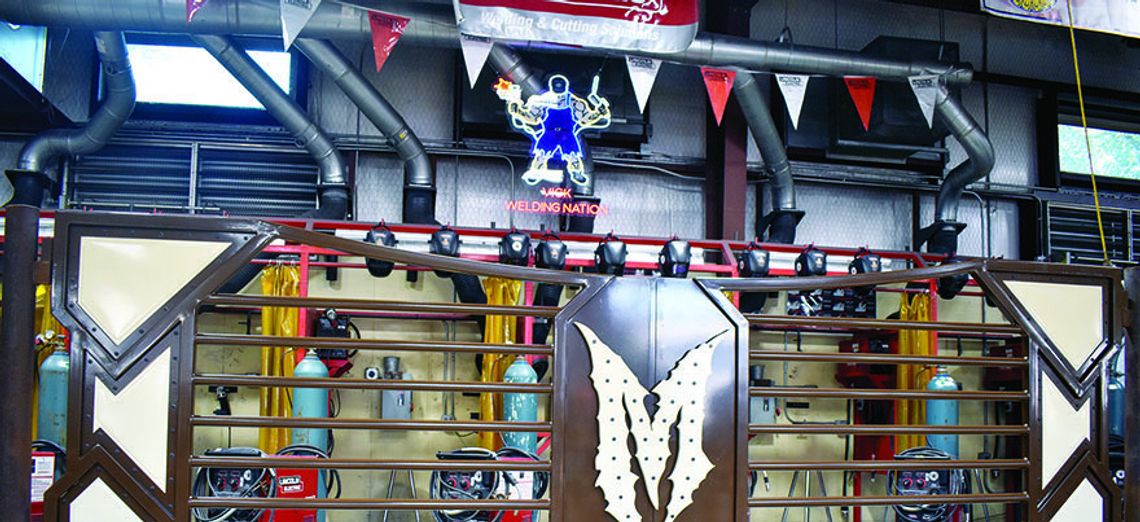 Champion welding presents custom-made gate to Martin Bros.