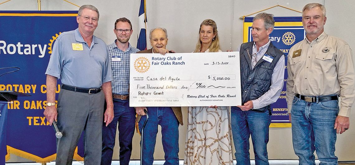 Fair Oak Ranch Rotary present check for ‘Eagle House’