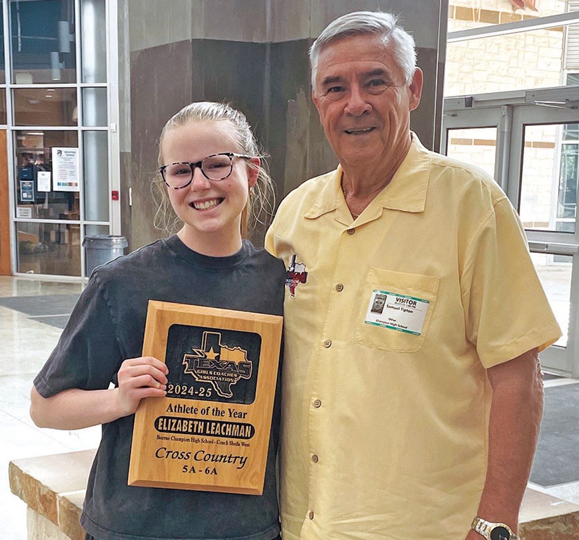 Leachman receives cross country award