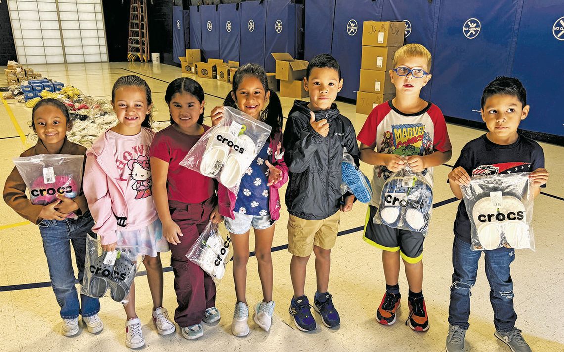 Little Feet, Big Hearts -- Family’s flood ‘moment’ attracts national attention