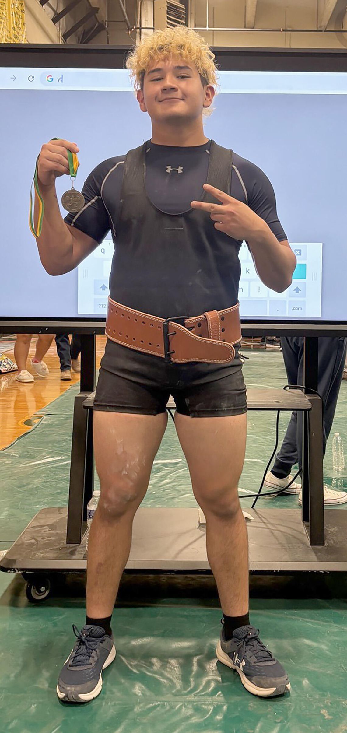 Medina competes for Champion at regional powerlifting meet