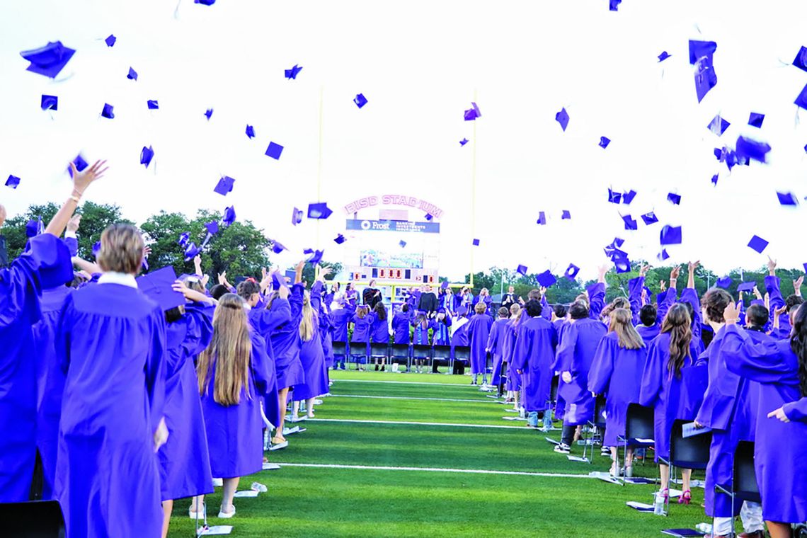Mortarboards fly at close of Boerne graduation Mortarboards fly at close of Boerne graduation