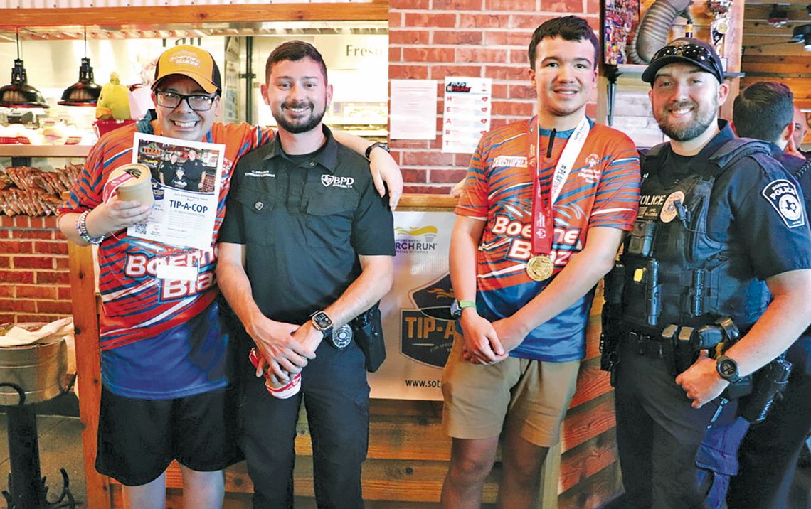 Officers take orders, serve food for Blaze fundraiser