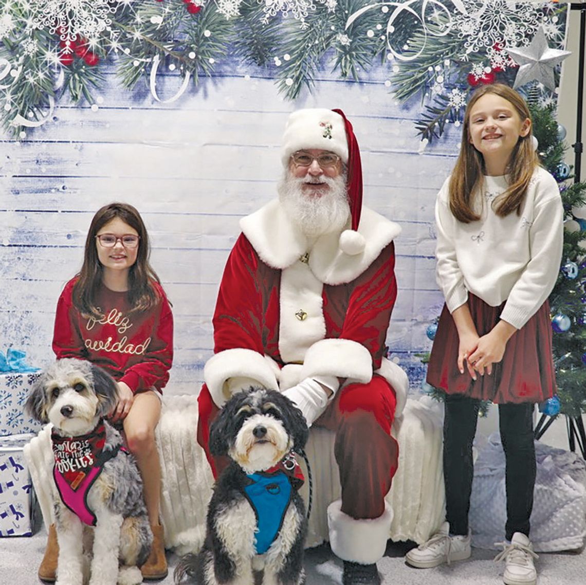 Striking a pose with Santa Paws Striking a pose with Santa Paws