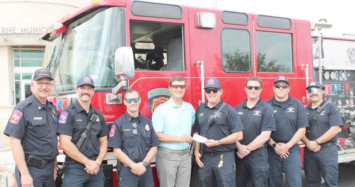 Tapatio Springs presents check to Boerne Fire Department