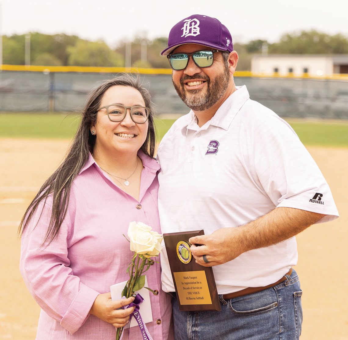 Voice of the Greyhounds softball team honored