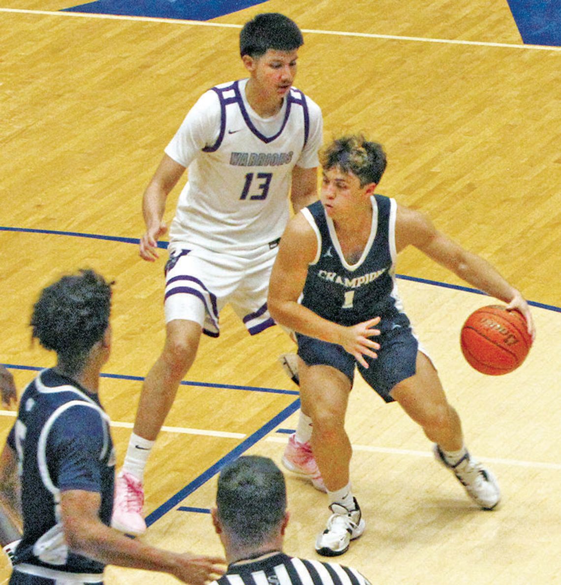 Warren holds off late Champion charge