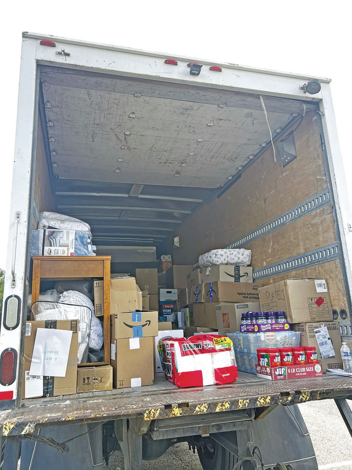 Woman uses social media to raise $15,000 for flood relief
