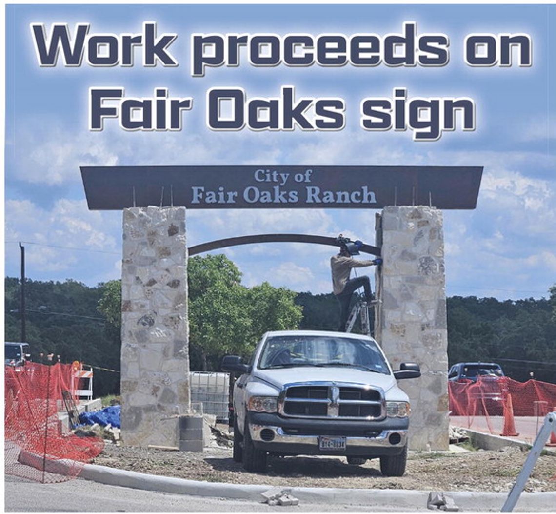 Work proceeds on the Fair Oaks sign