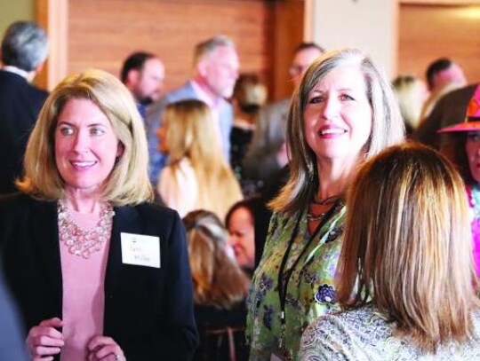 Herff Elementary School Principal Beth Miller, left, and BISD board of trustees President Donna Sharp take some time after Price’s address to chat with other attendees. Star photo by Zachary-Taylor Wright