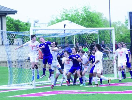 Boerne’s Landon Murphy sent a corner kick toward the Celina goal on Friday that Greyhounds Jake Herman (5), Joe Ballenger (7), Jess Gonzales (2) and Bear Kelly (8) react to. It appeared Ballenger headed it into the net, but the official scorekeeper listed it as an unassisted goal from Murp...