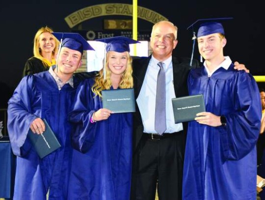 Boerne ISD Trustee Carlin Friar watched his triplets graduate on Thursday night. Pictured with him are Blake, Chloe and Grant Friar.  Star photo by Keith E. Domke