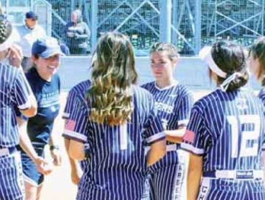 Champion softball coach Bethany Holtorf talks with her team during a game earlier this season. Eight Chargers received all-district recognition for the 2022 season. </br> Star photo by Kerry Barboza