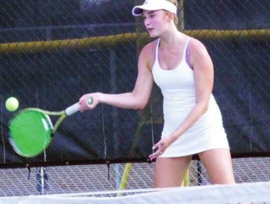 Eleanor Stokes competes for the BHS tennis team during the fall season.