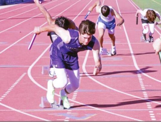 Boerne’s Braden Baize leaves the starting line for the Greyhounds at a meet earlier this year.