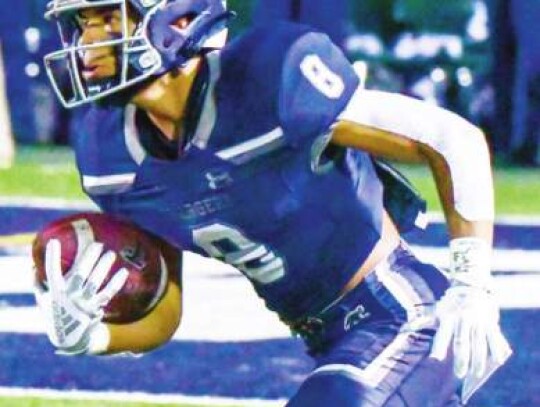 Jordan Ballin returns a kickoff for the Charger football team during a game last fall. </br> Star photo by Chris Tilton