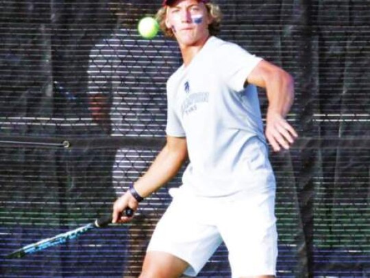 Hudson Morrow competes for the Champion tennis team during the fall season.