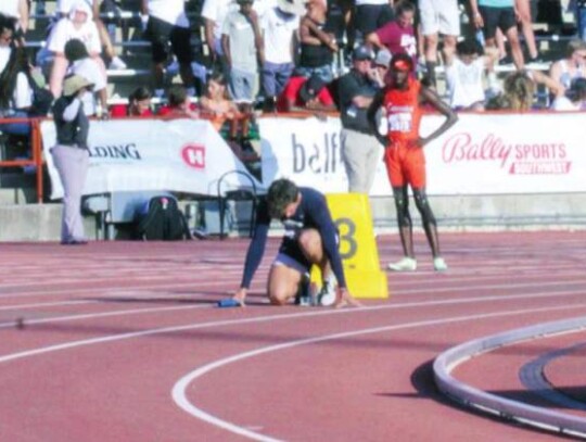 Sawyer Bolli gets ready to leave the starting block for one of the Charger relay teams at last spring’s state track and field meet.