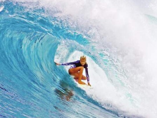 Brooks rides a wave during some time out on the water. </br> Submitted photos