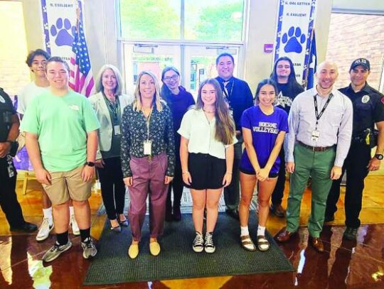 The BISD Communications and Safety and Security departments have worked to put together the “See Something, Say Something” campaign. Pictured are, from left, front row: Champion High School student Trent Adamson, Boerne Middle School North teacher Amber Waltz, CHS student Jacey Wolf, Boern...