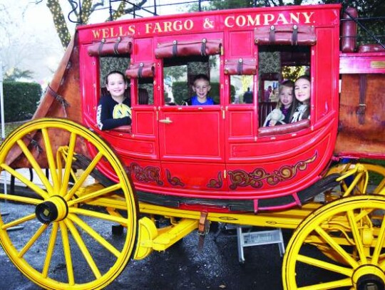 Champion High School volleyball players also were on hand at the school to greet students and help them out of their vehicles. One such Charger was Erin Fallon, who welcomed fifth-grader Caroline Perkins and her brother, third-grader William. 