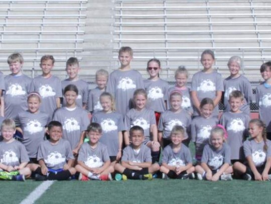 At the end of camp, the older and younger groups pose for photos in their camp T-shirts. </br> Star photos by Kerry Barboza