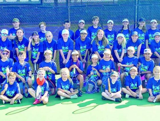 The youngsters received camp T-shirts and pose for a photo. </br> Star photos by Kerry Barboza