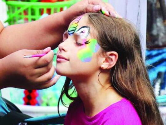 Valentina Vita was all smiles Sunday afternoon as her face was adorned with a butterfly. Star photo by Zachary-Taylor Wright